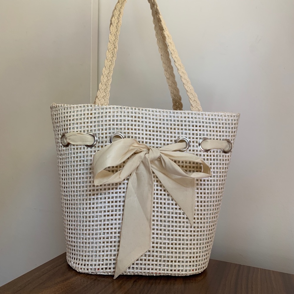 Cream and beige lightweight woven tote bag with ribbon bow